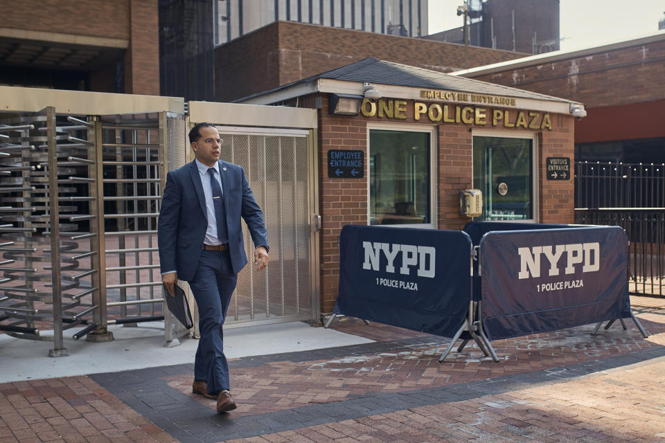 A man leaves the One Police Plaza NYPD Headquarters on Friday, Sept. 13, 2024, in New York. (AP Photo/Andres Kudacki)