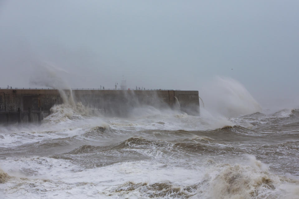 Waves cresting over Folkstone Harbour Arm as Storm Ciara swept in on February 9th 2020 in Folkestone, United Kingdom. Amber weather warnings were put into place by the MET office as gusts of up to 90mph and heavy rain swept across the UK. An amber warning from the MET office expects a powerful storm that will disrupt air, rail and sea links travel, cancel sports events, cut electrical power and damage property.  (photo by Andrew Aitchison / In pictures via Getty Images)