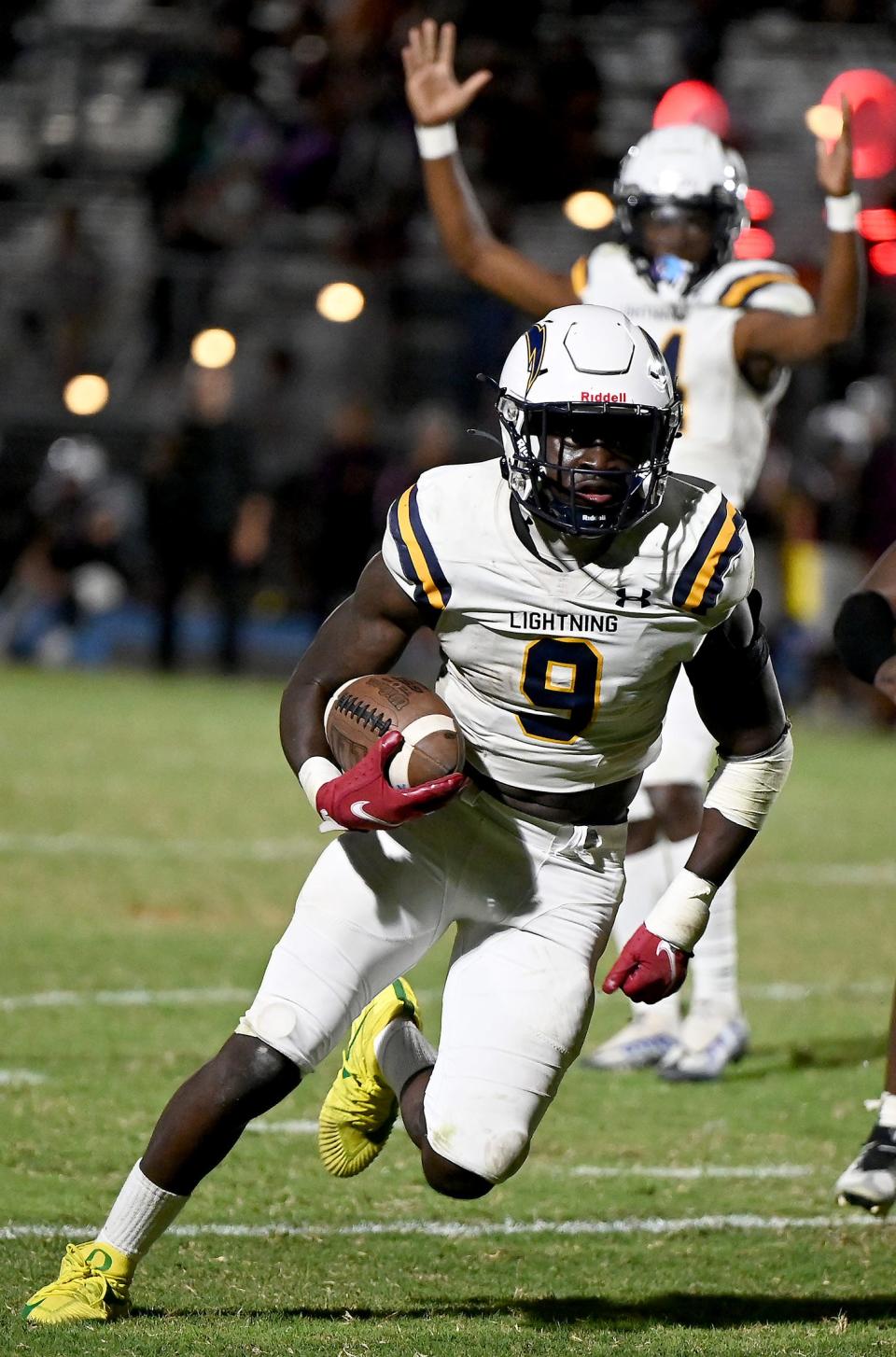 Lehigh High School's Richard Young (9) runs the ball during their game against Riverdale High School in Fort Myers, Friday, October 28, 2022.