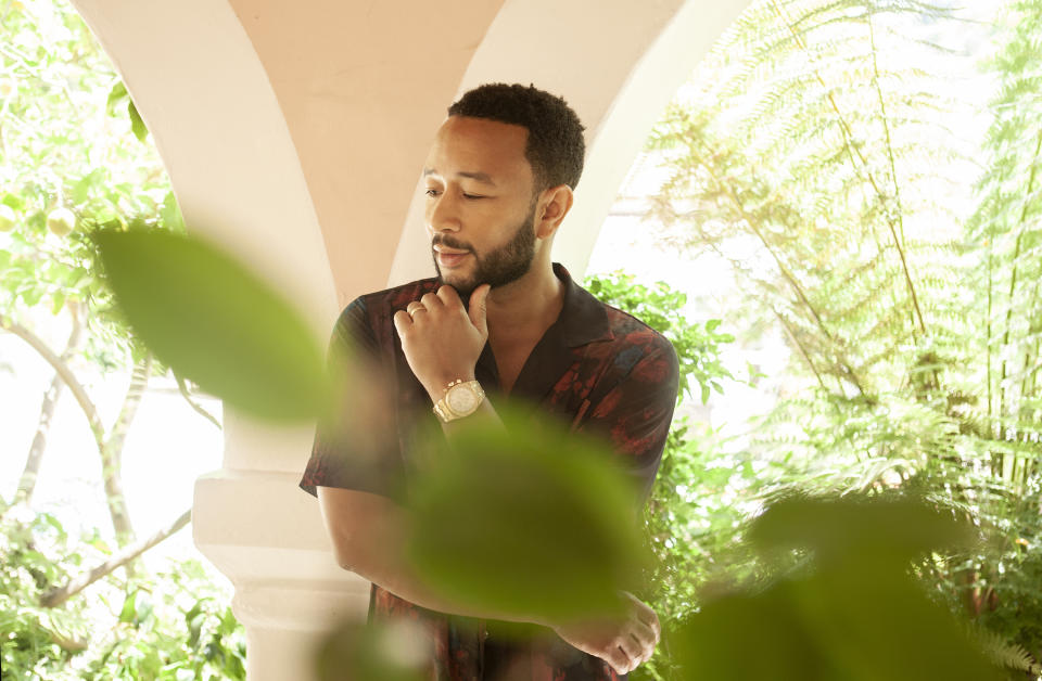 In this June 13, 2020 photo, singer-songwriter John Legend appears during a photo session at The Bel Air Hotel in Beverly Hills, Calif., to promote his latest album "Bigger Love." (Photo by Rebecca Cabage/Invision/AP)