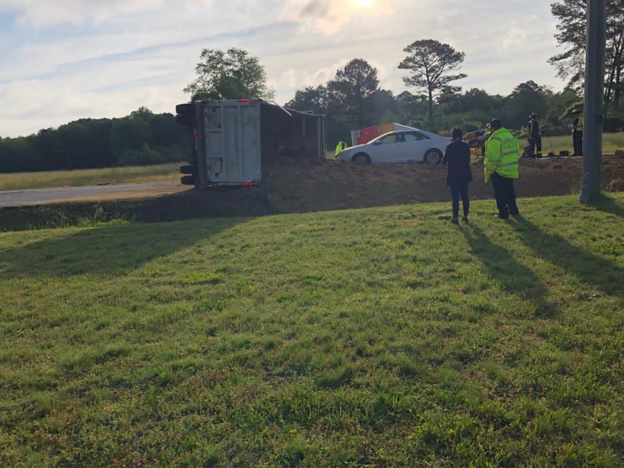 A dump truck and a box overturned in this four-vehicle crash on Friday in Suffolk (Courtesy of City of Suffolk)