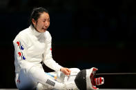 <b>Individual epee timing and appeal:</b> South Korean fencer Shin A-Lam was embroiled in a prolonged controversy at the ExCeL Centre on 30 July 2012. She had appeared to beat her opponent Britta Heidemann, but an issue developed around the timing clock, which had appeared to reset to 1 second after having counted down to zero, allowing Heidemann to score the winning point.<br><br> Shin was required to sit on the piste for almost an hour, often openly sobbing, while her coaches lodged an official complaint, prompting an announcer at the venue to confirm that moving from the piste would have been seen as indicating her acceptance of the ruling against her. After losing the protest, Shin fought, and lost, against Yujie Sun of China thirty minutes later in the bronze medal match.<br><br> <a href="http://in.news.yahoo.com/photos/fencing-controversy-causes-long-unusual-delay-slideshow/ " data-ylk="slk:Fencing controversy costs South Korea;elm:context_link;itc:0;sec:content-canvas;outcm:mb_qualified_link;_E:mb_qualified_link;ct:story;" class="link  yahoo-link">Fencing controversy costs South Korea</a><br> <a href="http://in.news.yahoo.com/south-koreas-shin-loses-bronze-protest-195332969--spt.html " data-ylk="slk:Shin loses bronze after protest;elm:context_link;itc:0;sec:content-canvas;outcm:mb_qualified_link;_E:mb_qualified_link;ct:story;" class="link  yahoo-link">Shin loses bronze after protest</a>