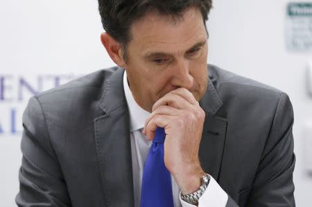 Cricket Australia Chief Executive James Sutherland pauses at a news conference, about the death of Australian cricketer Phillip Hughes, at St Vincent's Hospital in Sydney, November 27, 2014. REUTERS/Jason Reed