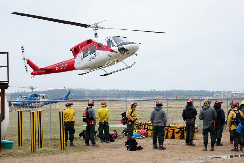 Wildfire causes evacuation from communities on the southern edge of Fort McMurray