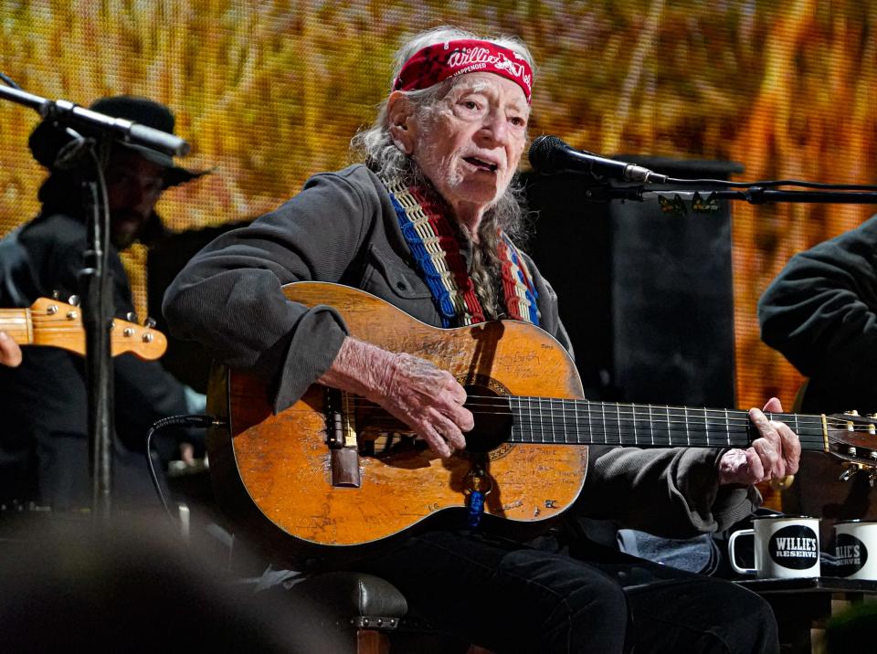 Willie Nelson performs Sept. 23 at Farm Aid 2023 at Ruoff Music Center in Noblesville, Ind. Nelson's farm advocacy was just one of his many accomplishments celebrated Friday during his Rock & Roll Hall of Fame induction.