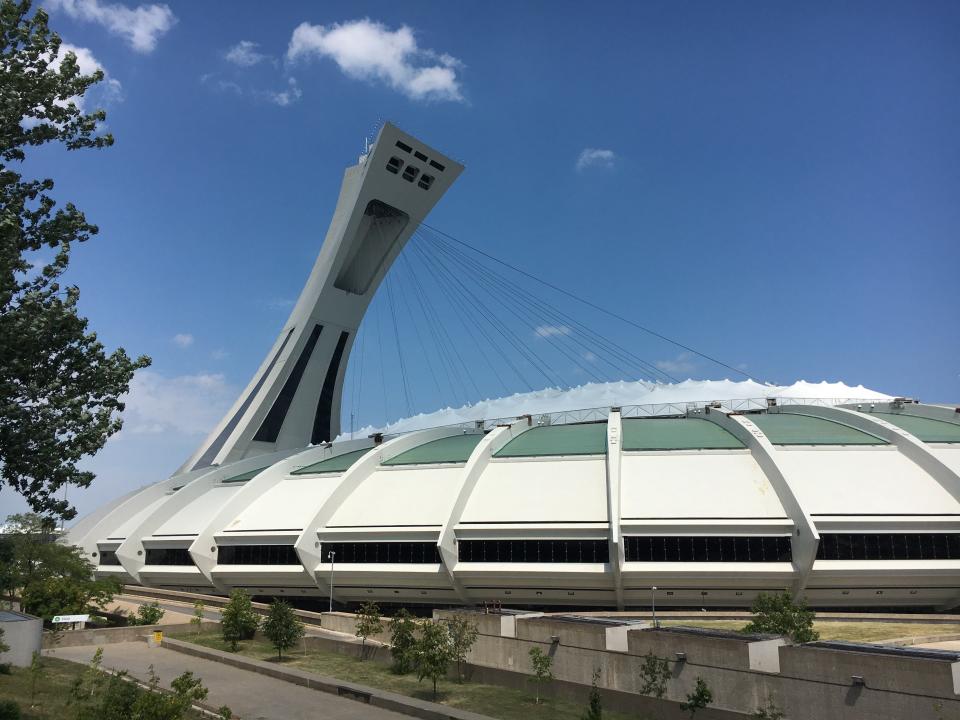 Olympic Stadium and Montreal Tower, the world's tallest inclining tower.