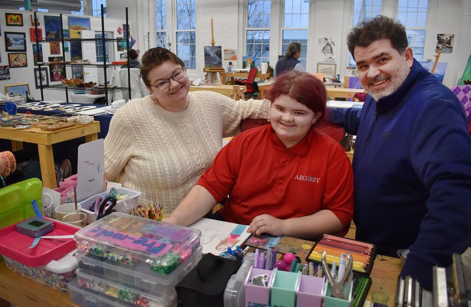 Jennifer and Nelson Rego, seen here with their daughter Amalia, a 13-year-old artist and entrepreneur, are co-owners of the new Soco Art Labs, located at 145 Globe St., Fall River.