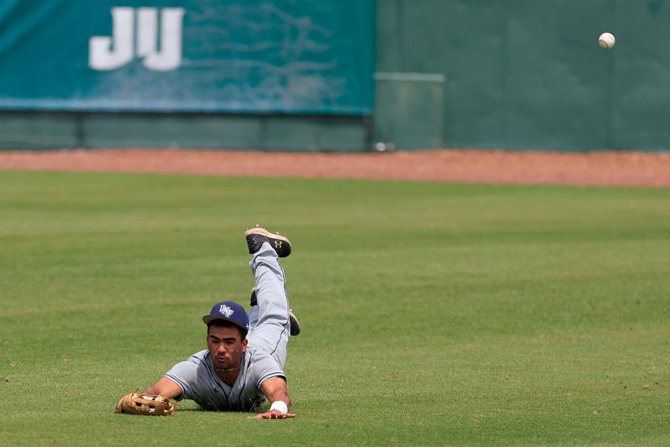 North Florida outfielder Austin Brinling (28) can’t catch an out in centerfield during the seventh inning of an NCAA baseball game Saturday, May, 20, 2023 at Jacksonville University’s John Sessions Stadium in Jacksonville, Fla. Jacksonville edged North Florida 3-2 in 11 innings. 