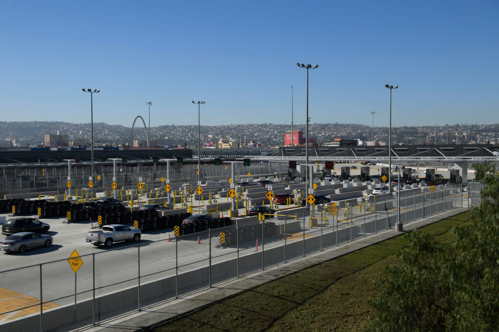  Vehicles enter a border checkpoint at the US Customs and Border Protection (CBP) San Ysidro Port of Entry at the US-Mexico border. 