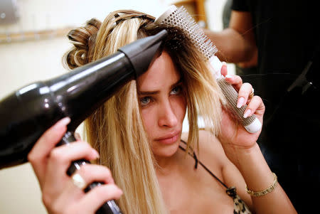 Eliane Nesiel, one of 12 contestants, prepares ahead of the first-ever Miss Trans Israel beauty pageant in Tel Aviv, Israel May 27, 2016. REUTERS/Amir Cohen