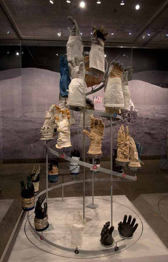 The helix display in the National Air and Space Museum exhibit "Outside the Spacecraft" shows 26 different gloves used by astronauts during spacewalks.