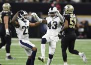 Jan 20, 2019; New Orleans, LA, USA; Los Angeles Rams strong safety John Johnson (43) and cornerback Marcus Peters (22) celebrate after an interception against the New Orleans Saints during overtime in the NFC Championship game at Mercedes-Benz Superdome. Mandatory Credit: John David Mercer-USA TODAY Sports