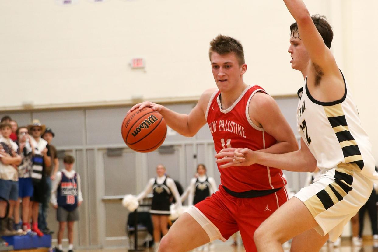 New Palestine Julius Gizzi (11) looks for an opening to the basket as New Palestine plays Mt. Vernon High School in the IHSAA Class 4A Boys Basketball S9 Sectional, Feb 27, 2024; Greenfield, IN, USA; at Greenfield-Central High School.