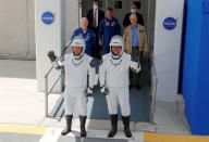 NASA astronauts Douglas Hurley and Robert Behnken head to launch pad 39 to board a SpaceX Falcon 9 rocket for a second launch attempt on NASA’s SpaceX Demo-2 mission to the International Space Station from NASA’s Kennedy Space Center in Cape Canaveral