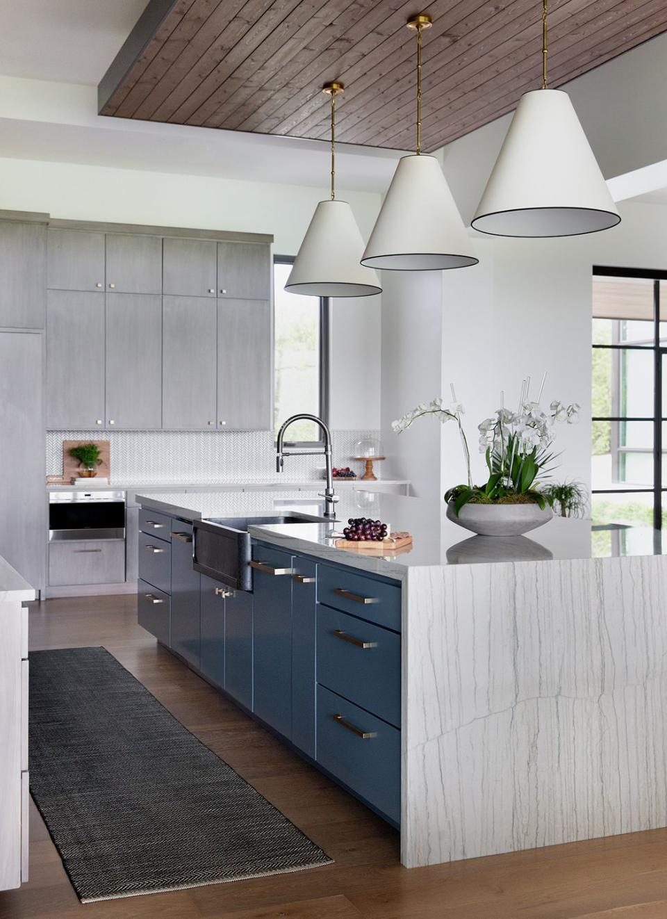 a kitchen with white cabinets