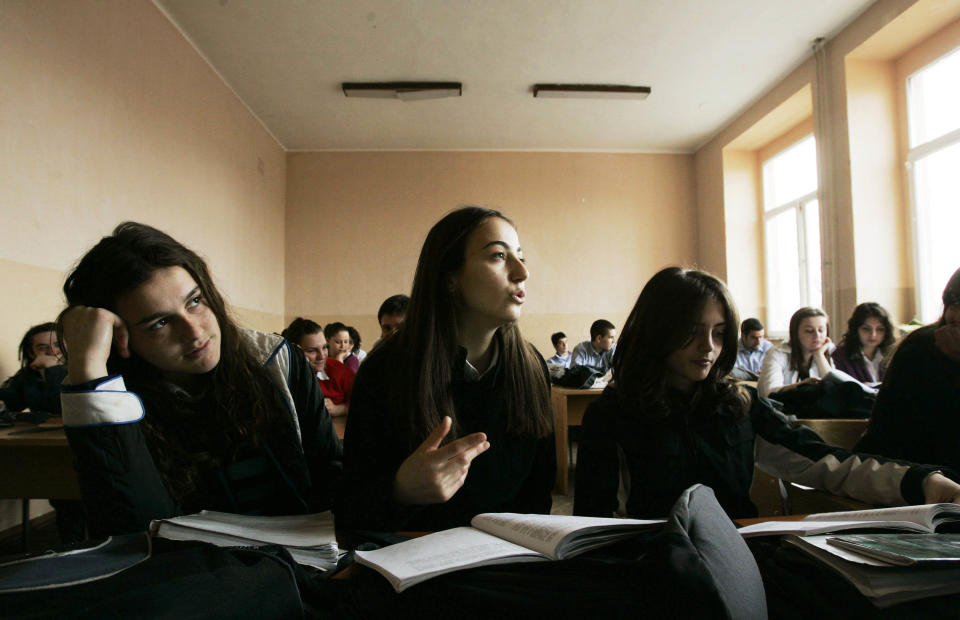 A Kosovo Albanian girl answers a question in a sociology class at Sami Frasheri high school in Pristina, March 2007. (At the time Kosovo was in the process of formalizing its independence from Serbia.)