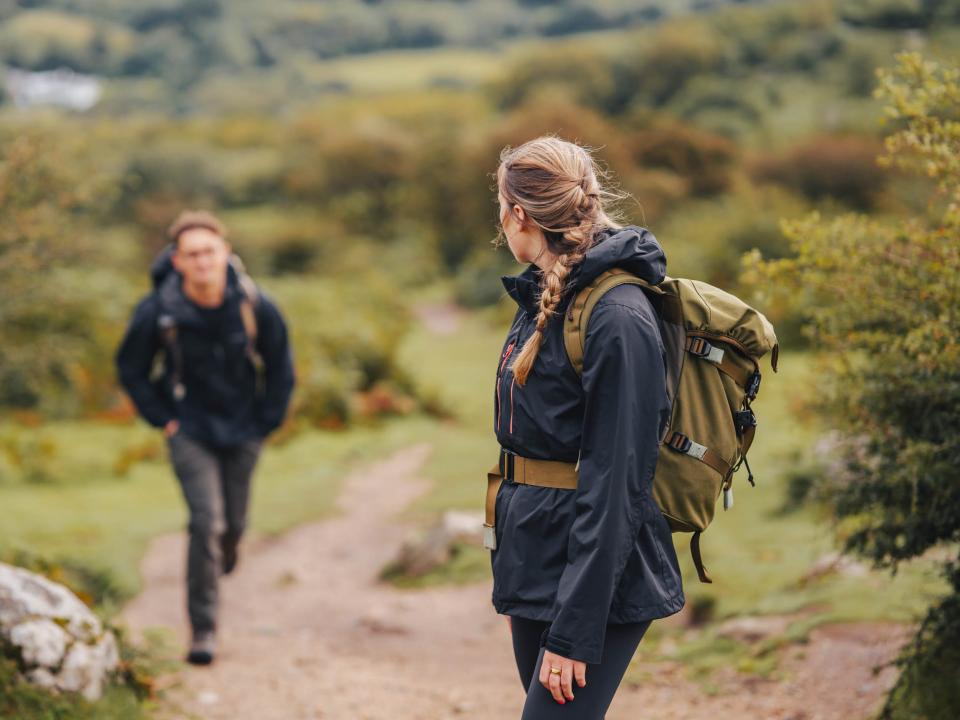 Rachel walks with her partner