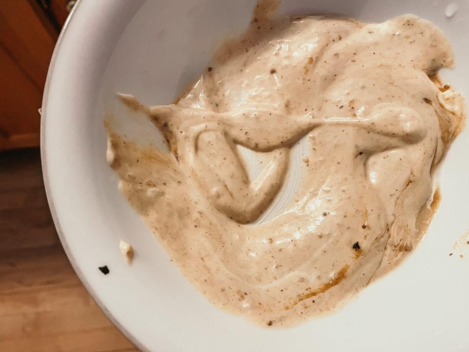 mustard based sauce in a white bowl