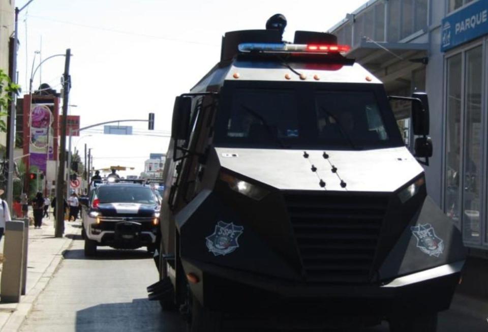 An armored vehicle of the Chihuahua state police makes its way down a street in Juárez, Mexico, in 2023.