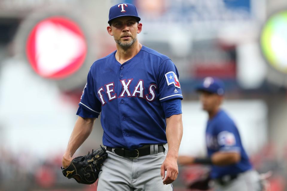 Texas Rangers starting pitcher Mike Minor (23) walks off the field in the second inning of an MLB baseball game against the Texas Rangers, Saturday, June 15, 2019, at Great American Ball Park in Cincinnati. 
