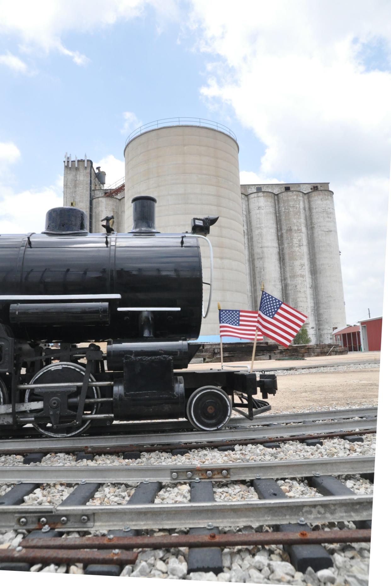 This mini-train locomotive at the Lehnis Railroad Museum travels past silos. The museum is across the road from the renovated Santa Fe Railroad Depot, which includes a small museum dedicated to Harvey Girls, who ran restaurants and inns along western rail lines.