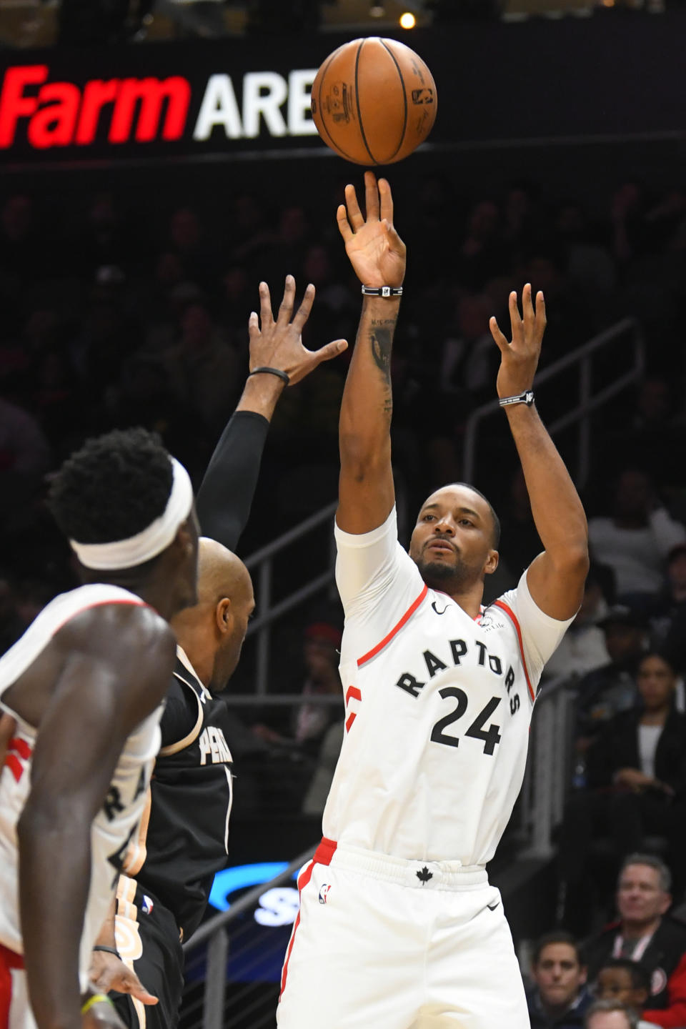 Toronto Raptors guard Norman Powell (24) shoots during the second half of an NBA basketball game against the Atlanta Hawks, Monday, Jan. 20, 2020, in Atlanta. Toronto won 122-117. (AP Photo/John Amis)