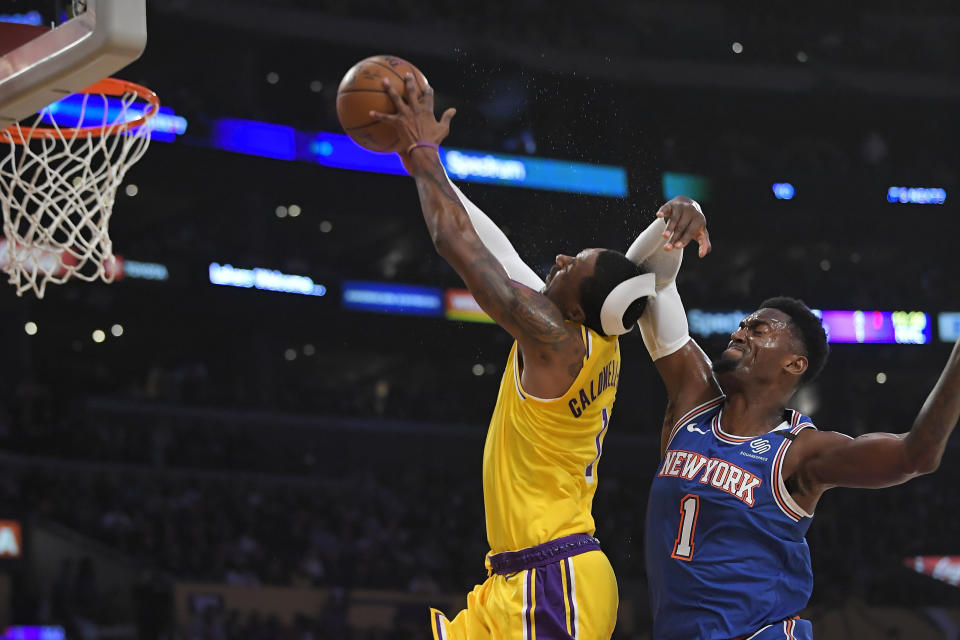 New York Knicks forward Bobby Portis, right, fouls Los Angeles Lakers guard Kentavious Caldwell-Pope during the first half of an NBA basketball game Tuesday, Jan. 7, 2020, in Los Angeles. Portis was ejected from the game after the foul. (AP Photo/Mark J. Terrill)