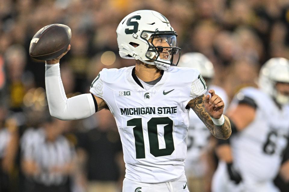 Michigan State Spartans quarterback Noah Kim (10) throws a pass against the Iowa Hawkeyes during the first quarter at Kinnick Stadium in Iowa City, Iowa, on Saturday, Sept. 30, 2023.