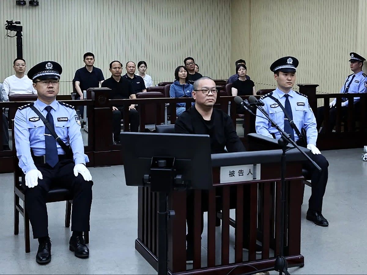 Bai Tianhui during his sentencing at a court in Tianjin on 28 May (Getty)