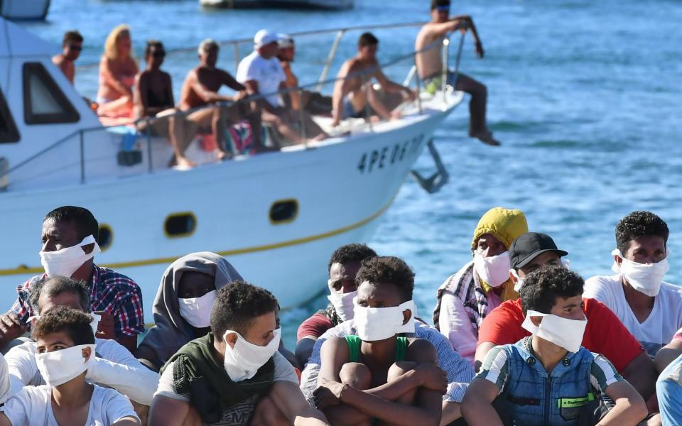 The mayor of Lampedusa says the tiny island cannot handle the migrant arrivals  - AFP