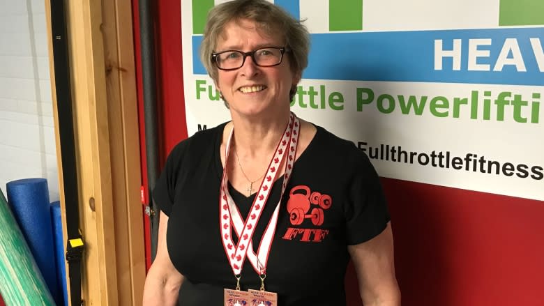 Woman battles through Crohn's to medal at power lifting championship