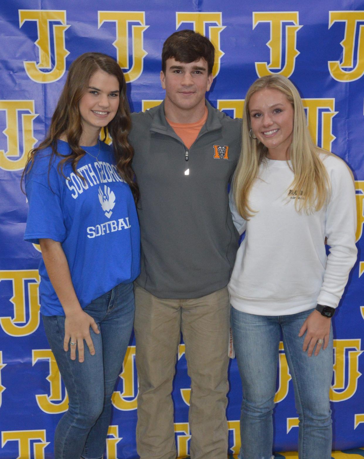 Thomas Jefferson Academy seniors Zoie Irby, John John Durden and Whitney Wells all signed letters of intent to play college ball.