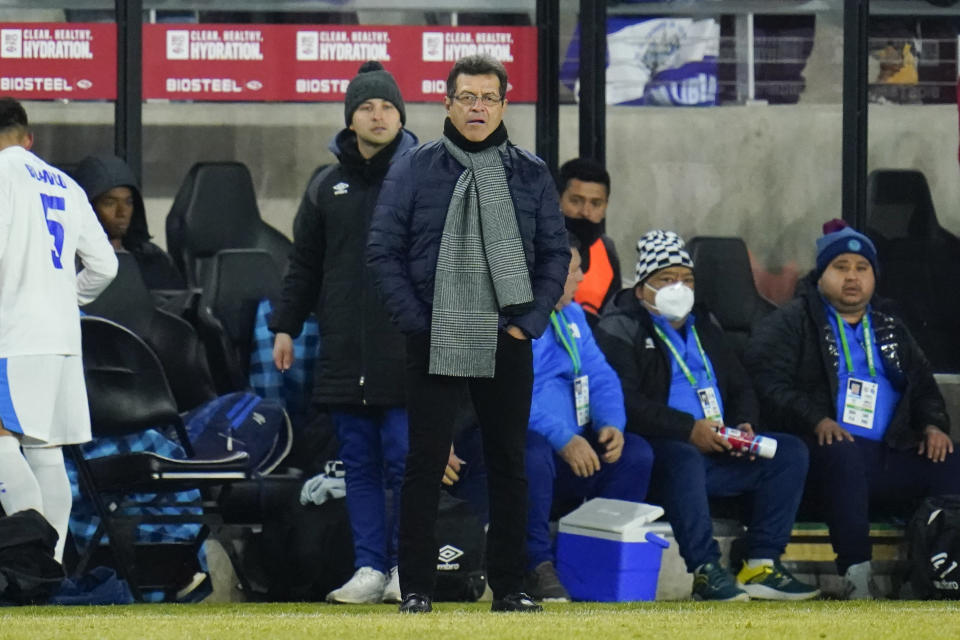 El Salvador head coach Hugo Perez, center, looks on during the second half of a FIFA World Cup qualifying soccer match against the United States, Thursday, Jan. 27, 2022, in Columbus, Ohio. The U.S. won 1-0. (AP Photo/Julio Cortez)