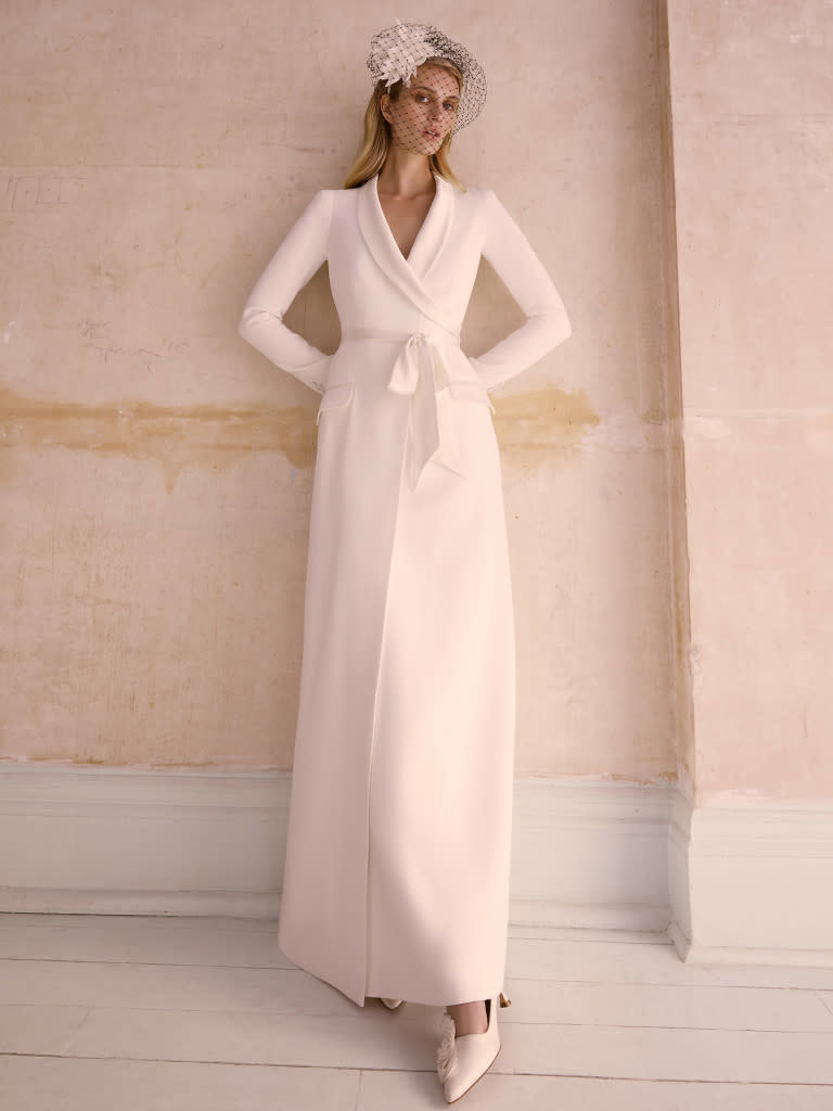 <p>Enter the courthouse gown of our dreams: <a href="https://www.temperleylondon.com/" rel="nofollow noopener" target="_blank" data-ylk="slk:Temperley;elm:context_link;itc:0;sec:content-canvas" class="link ">Temperley</a>'s "Garin" wrap dress, composed of crepe satin, hits that City Hall blazer-inspired note, but offers the gravitas of a full-blown wedding dress thanks to the length. </p>
