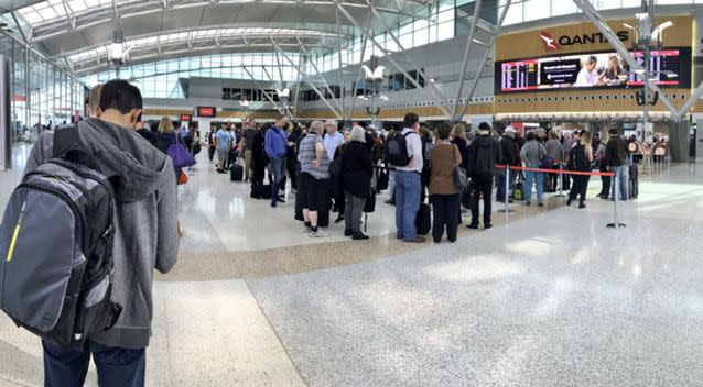 Photos posted to social media show check-in huge queues snaking through Sydney airport. Photo: Twitter/ Tyson Armstrong