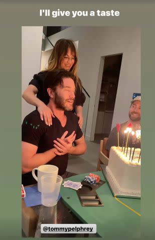 <p>Kaley Cuoco/Instagram</p> Kaley Cuoco holds boyfriend Tom Pelphrey as he blows out the candles at his 41st birthday party.