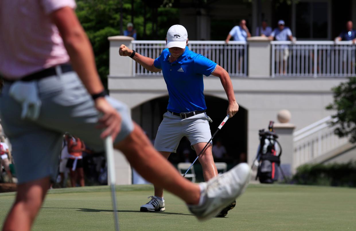 Caleb Surratt, 17, celebrates after making a birdie on the 18th hole Sunday afternoon, April 25, 2021 to win the 25th Annual Terra Cotta Invitational at Naples National Golf Club. Maxwell Ford, in foreground, reacts as he came in second place. 