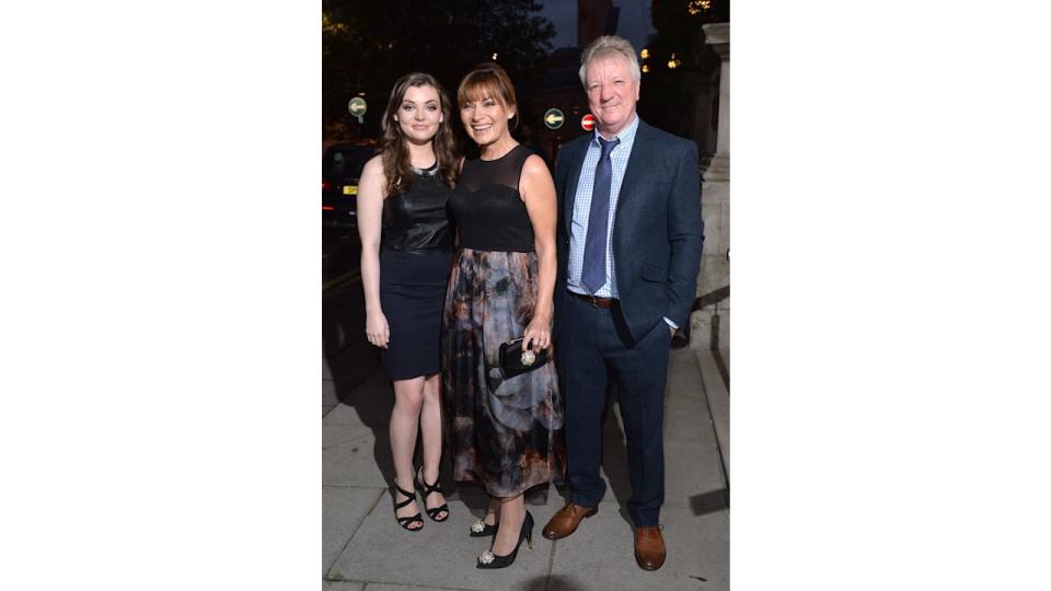 Lorraine Kelly in a black dress with her husband Steve Smith and daughter Rosie