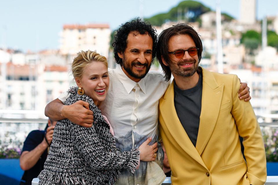 Maria Bakalova, director Ali Abbasi and Sebastian Stan attend a photocall for "The Apprentice" at the Cannes Film Festival. Former President Donald Trump's campaign has threatened to take legal action over the film.