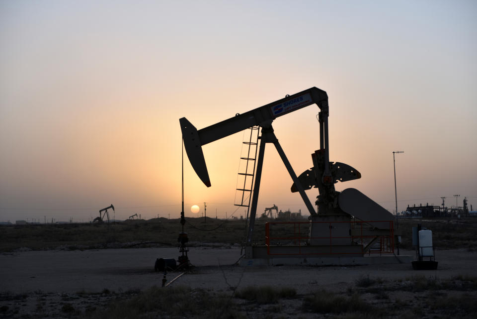 Pump jacks operate at sunset in Midland, Texas U.S. February 11, 2019. Picture taken February 11, 2019.  REUTERS/Nick Oxford