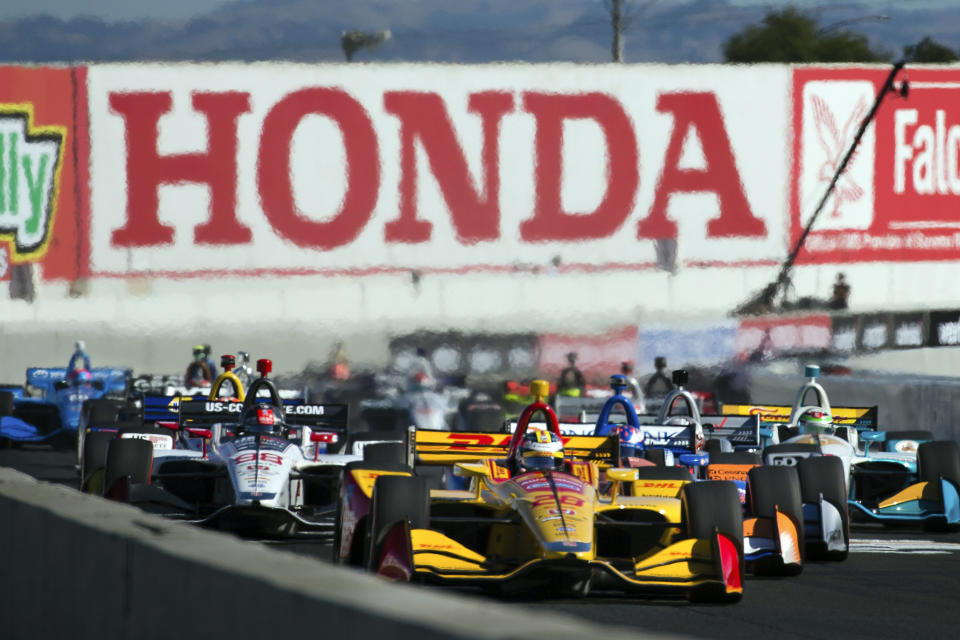 FILE - Ryan Hunter-Reay (28) leads in the Verizon IndyCar Grand Prix of Sonoma auto race, Sunday, Sept. 16, 2018, in Sonoma, Calif. Honda, not unlike many of the team owners, have concerns about a sense of stagnancy in a series that is otherwise a fantastic racing product. The decision by IndyCar to delay the introduction of a new hybrid engine until after the Indy 500 in May, didn't make anyone happy. (AP Photo/Elijah Nouvelage, File)