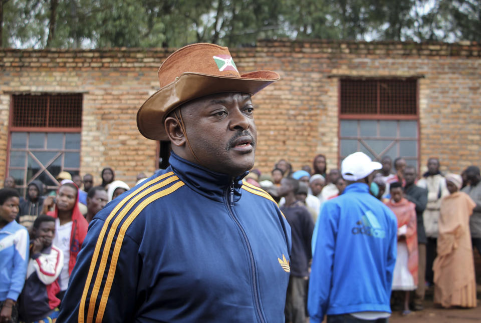 FILE - In this Thursday, May 17, 2018 file photo, Burundi's President Pierre Nkurunziza speaks to the media after casting his vote in the constitutional referendum in Buye, northern Burundi. Burundi’s president has again indicated he will not run for another term next year in the politically volatile East African nation. Pierre Nkurunziza on Thursday Dec. 26, 2019, told reporters he planned to hold another press conference “before handing power to our successor.” (AP Photo/Berthier Mugiraneza, File)