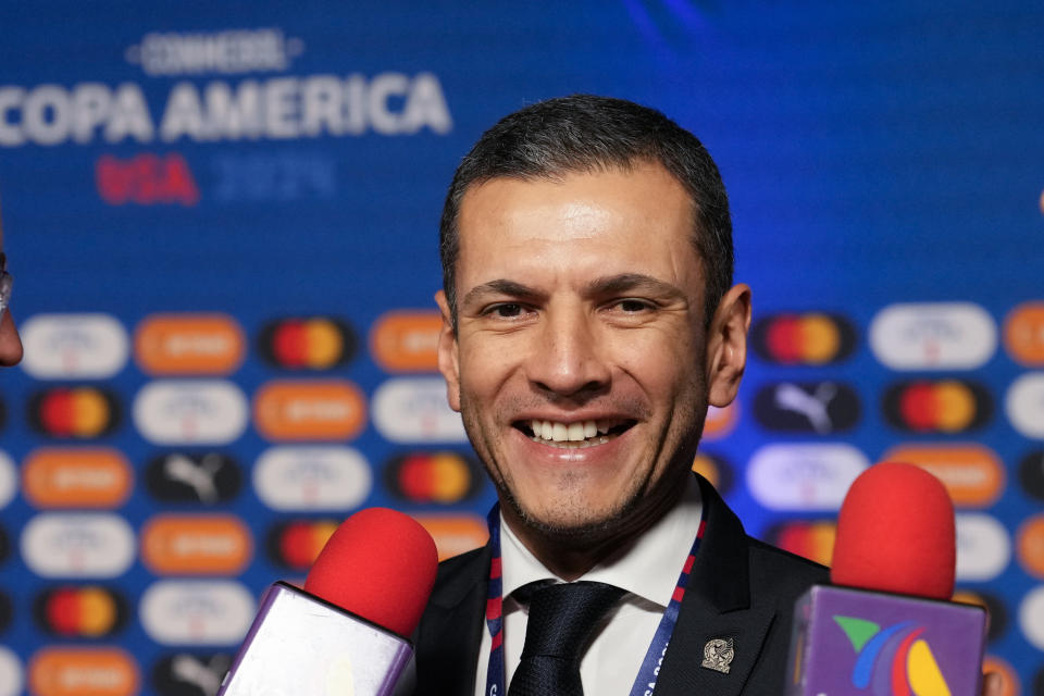 Mexico head coach Jaime Lozano talks to journalists prior to the draw ceremony for the Copa America soccer tournament, Thursday, Dec. 7, 2023, in Miami. The 16-nation tournament will be played in 14 U.S. cities starting with Argentina's opener in Atlanta on June 20, 2024. (AP Photo/Lynne Sladky)