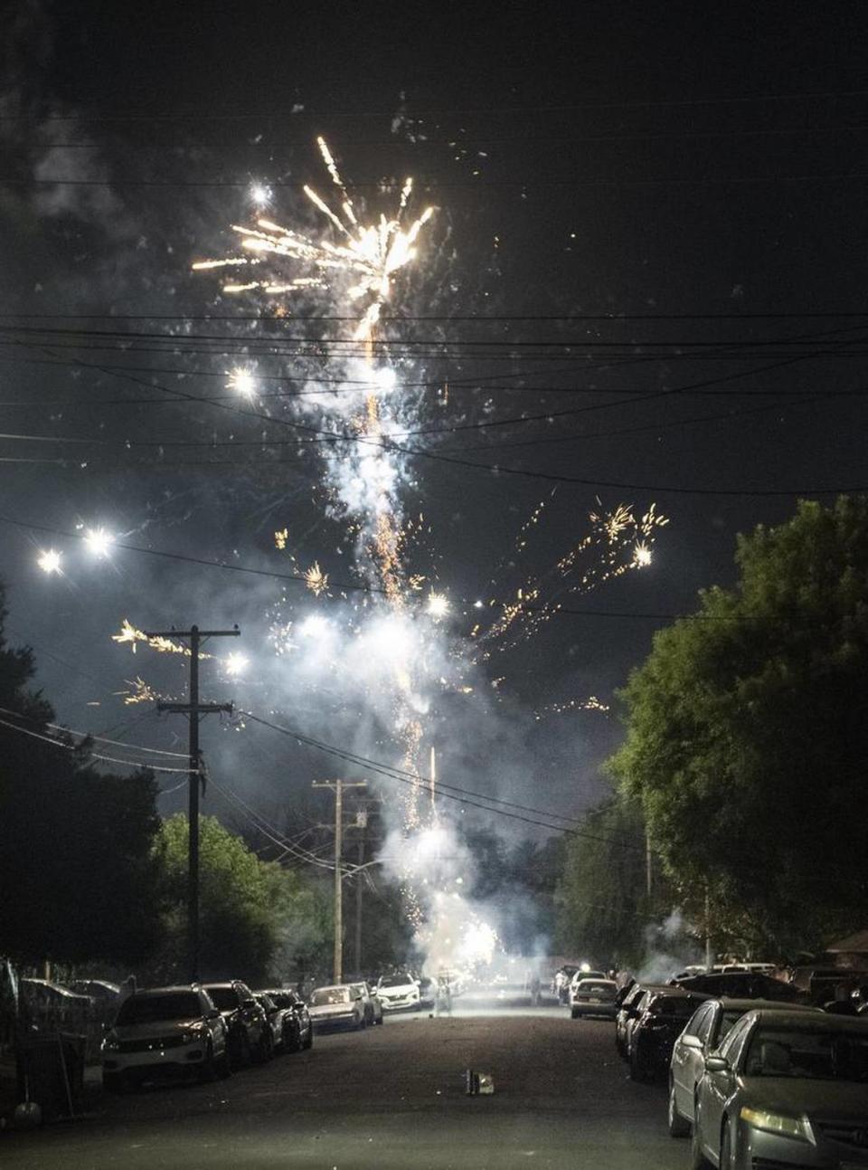 Illegal fireworks light up the street in Modesto Calif., Thursday, July 4, 2019. Andy Alfaro/aalfaro@modbee.com