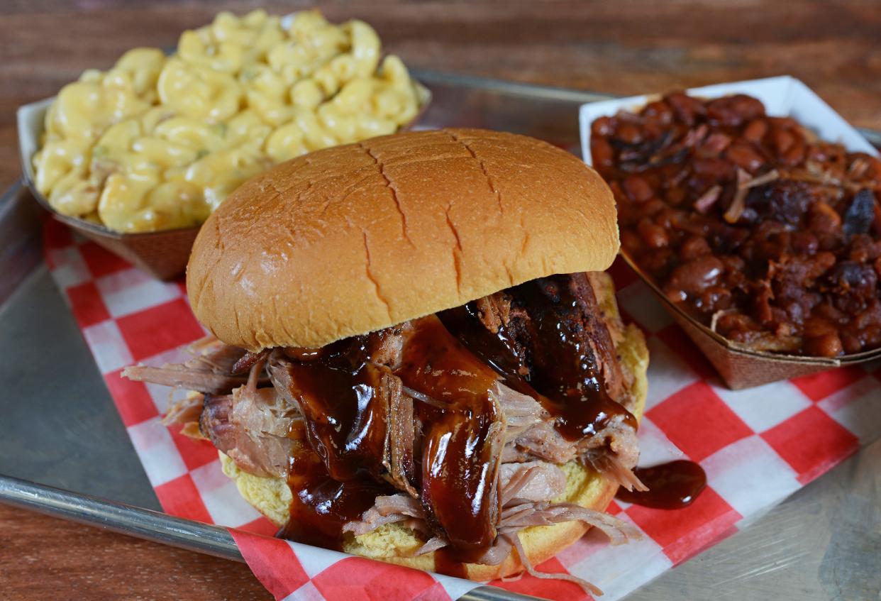 A pulled pork sandwich is served at Okeechobee Prime Barbecue in West Palm Beach.