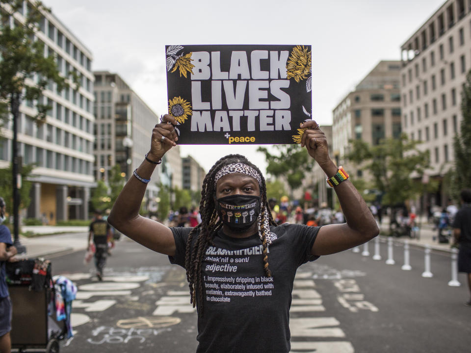 A demonstrator in Washington this summer. (Photo: Probal Rashid via Getty Images)