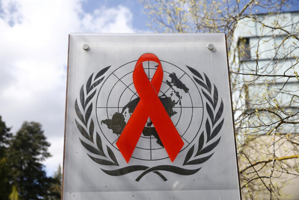 A logo is pictured outside a building of the United Nations AIDS agency (UNAIDS) in Geneva, Switzerland, April 6, 2021. Picture taken April 6, 2021. REUTERS/Denis Balibouse