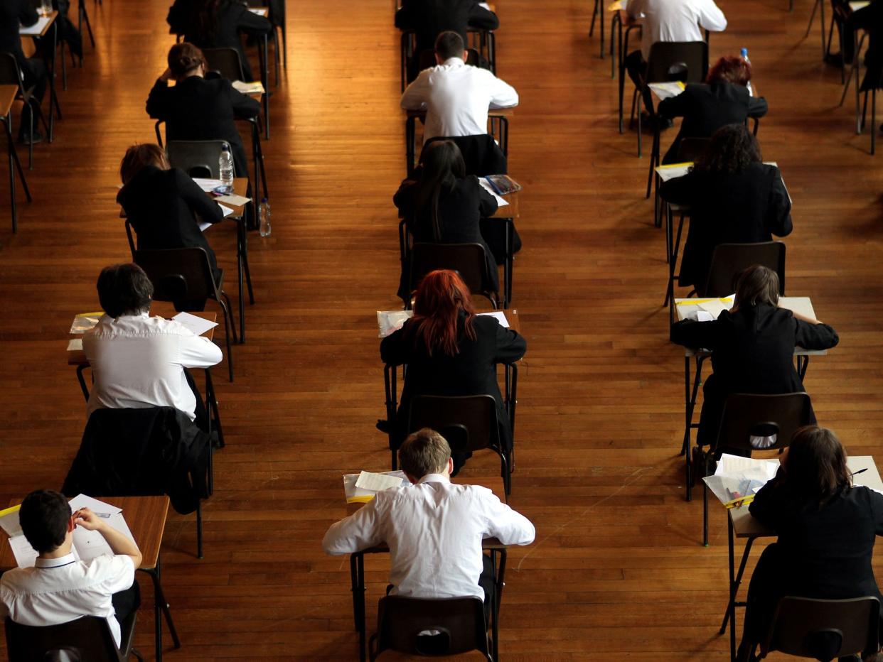 An extra 1,000 poor students would gain top GCSE grades each year if high-achieving disadvantaged pupils performed as well as high-achieving students: PA