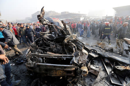 Wreckage is seen at the site of a car bomb attack at a vegetable market in eastern Baghdad, Iraq January 8, 2017. REUTERS/Wissm al-Okili