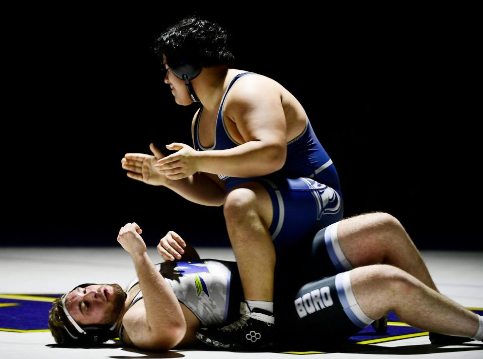 Chambersburg's Frank Barrientos, top, celebrates the pin against Cort Myers of Waynesboro at 285 pounds. Chambersburg finished 50-18 over Waynesboro, December 13, 2023.